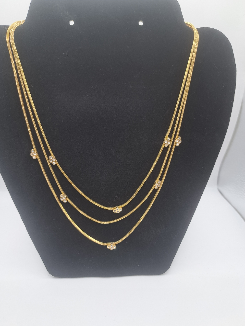 Avon Gold Multi-Strand Necklace with Floral Crystal Accents